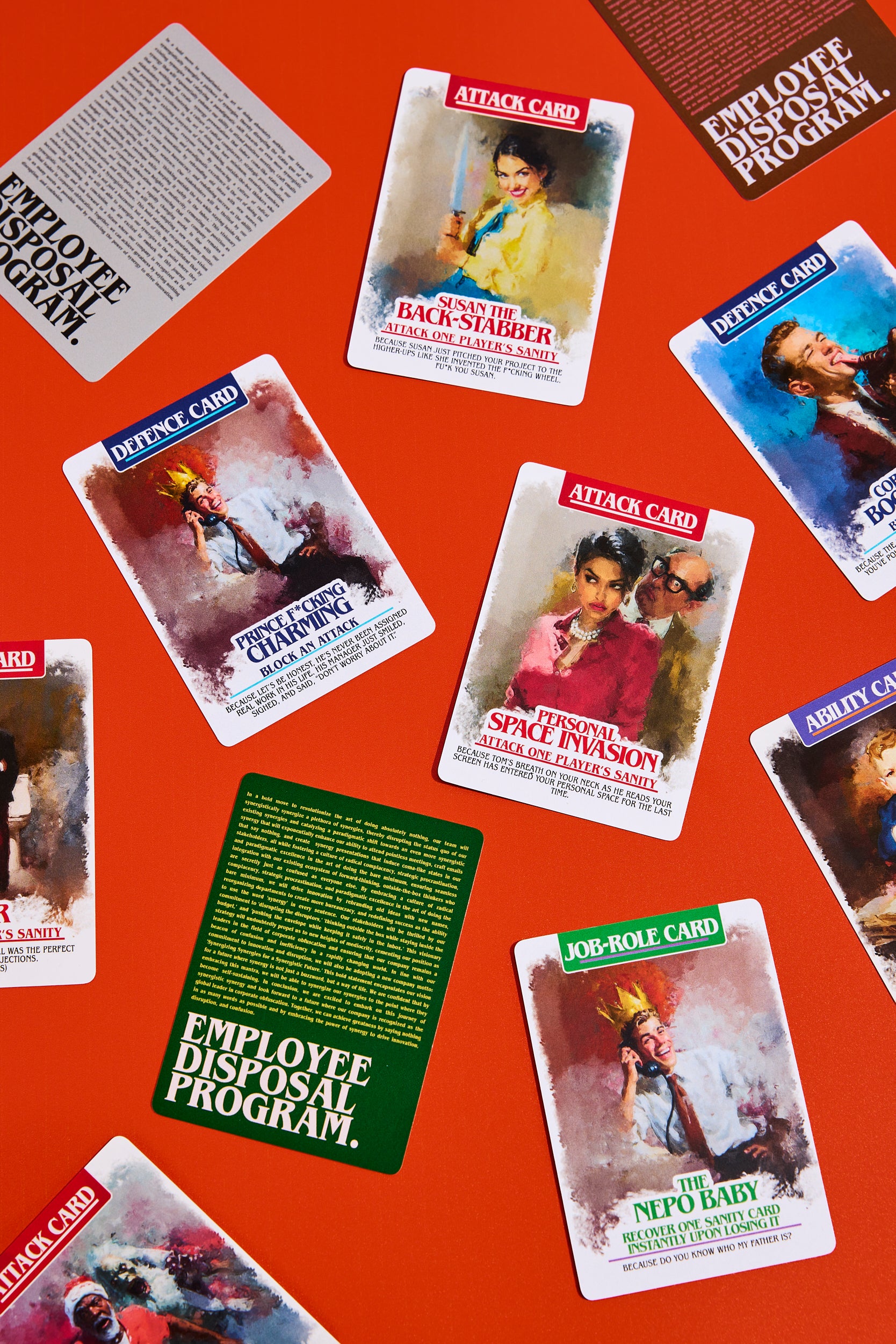 Close-up of satirical attack, defence and job-role cards from the Employee Disposal Program party card game